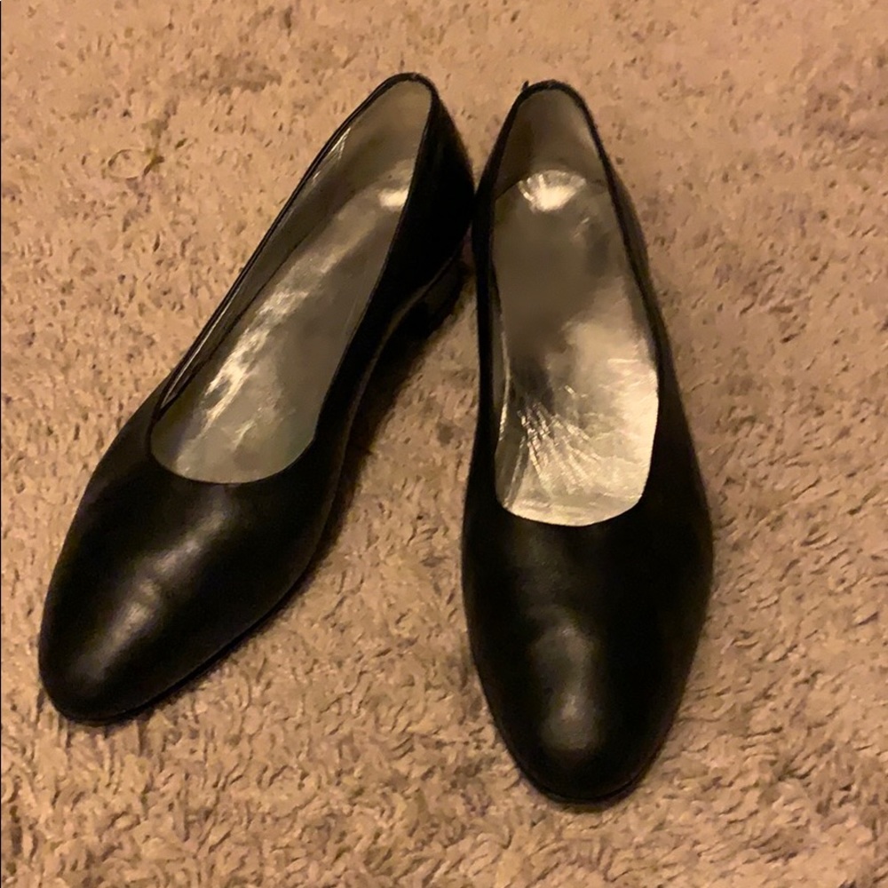 Custom made black flat with low heel.
